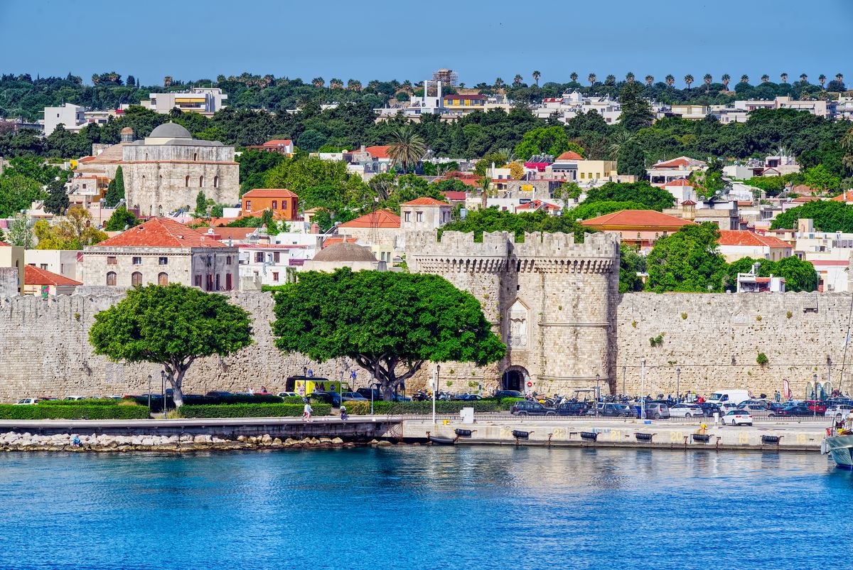 The medieval walls of Rhodes Town from the harbour