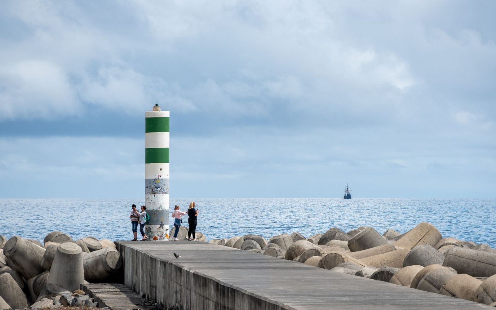The lighthouse at the end of Funchal's harbour pier, Madeira